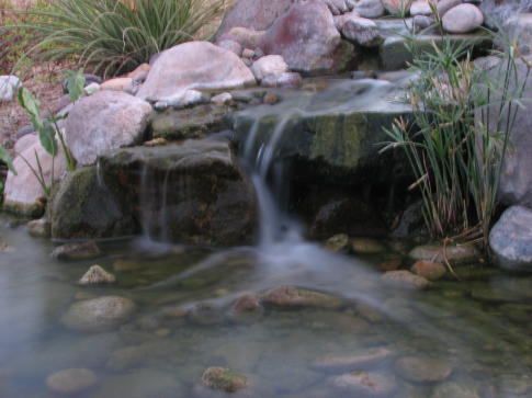 sloped front yard landscaping pictures. rock landscape